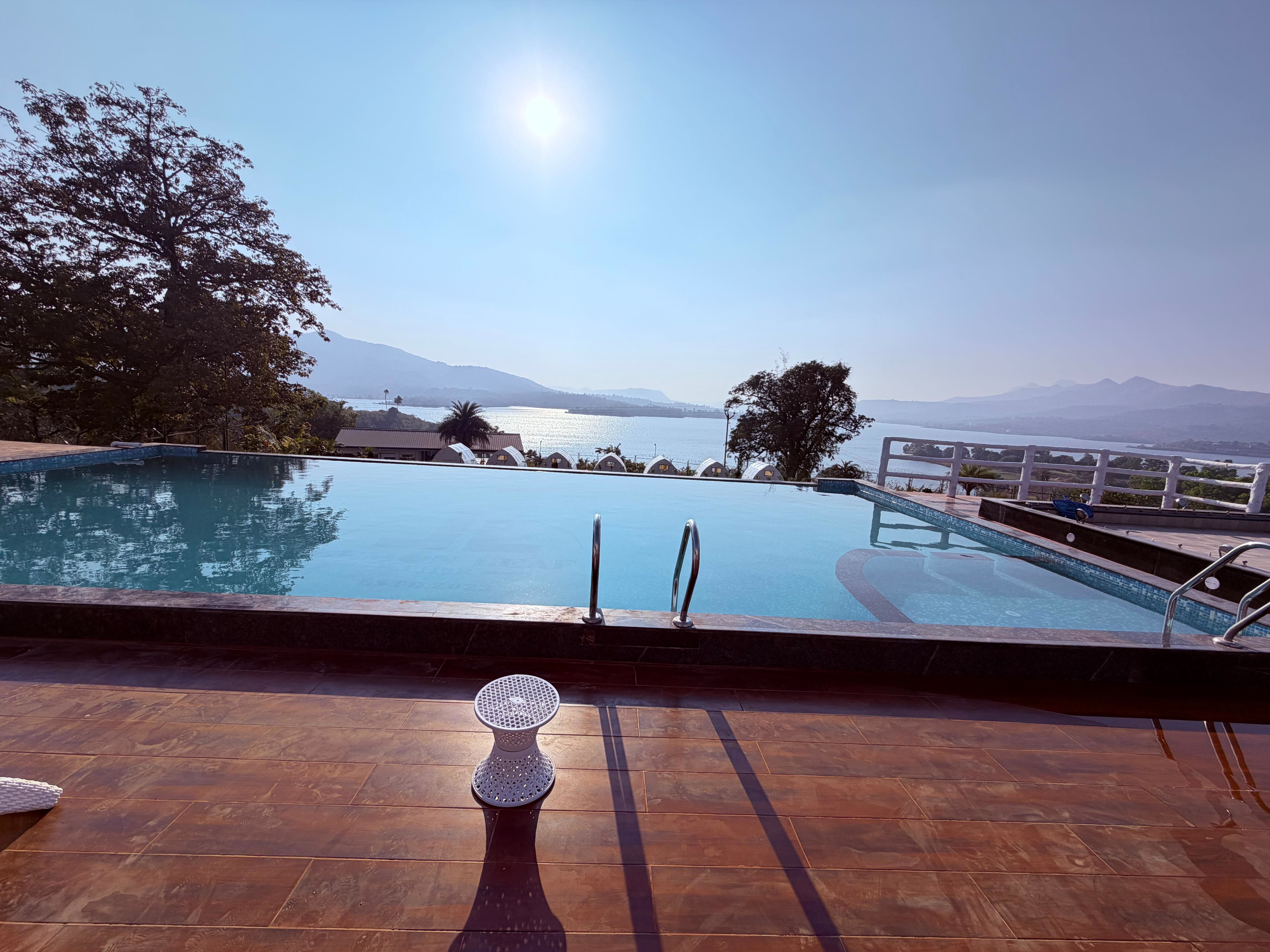 Infinity pool with lake view at Lemon Leaf Resort